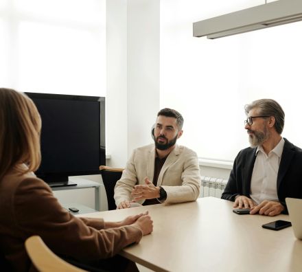 Photograph of a Group of People Talking